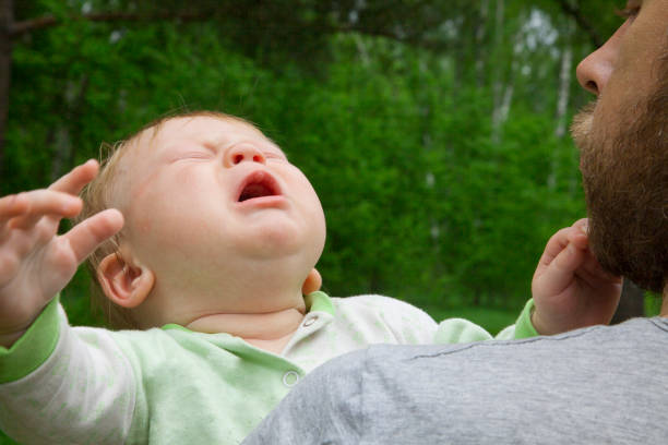 istock Father consoling crying baby boy 807662994