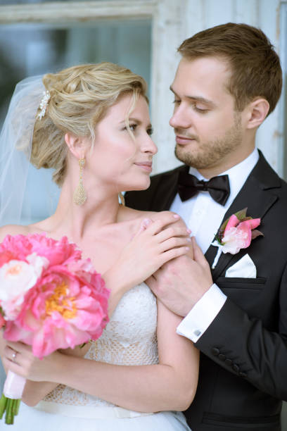 istock Wedding couple on the nature is hugging each other 807663430