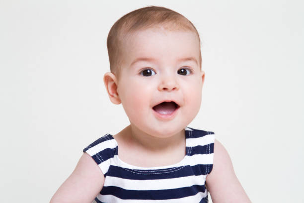 istock Beautiful smiling cute baby girl 807664400