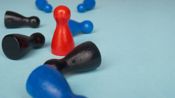 istock Game figures as a concept for success, competition, challenge and fighting with copy space. 807715986
