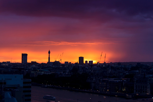 Aerial view of London's skyline at sunset
