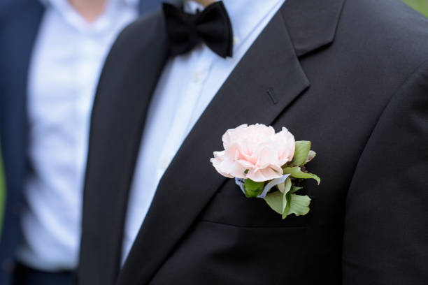 istock Handsome groom in suit in the nature 807720076