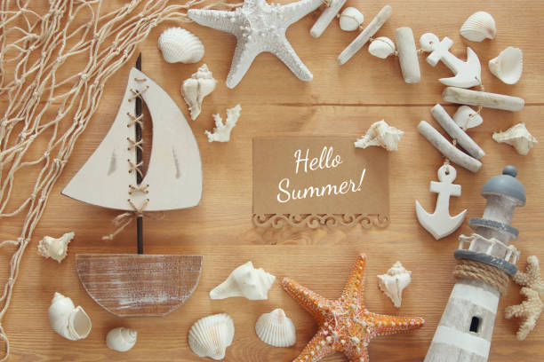 istock Top view of Nautical concept with sea life style objects on wooden table 807720768
