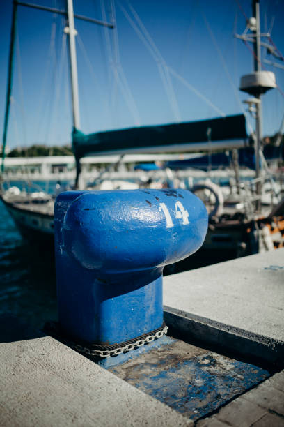 istock Blue aged boat mooring at port 807739510