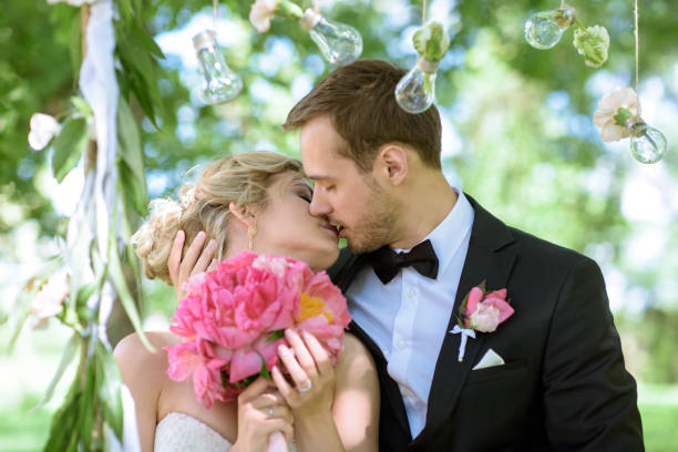 istock Wedding couple on the nature is hugging each other 807741754
