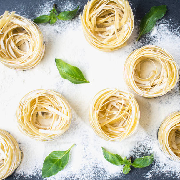 istock Tasty Fresh Colorful Ingredients for Cooking Pasta Tagliatelle 807748312