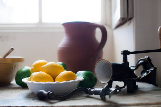 istock Cottage kitchen. Lemons on a vintage English country kitchen table. 807753518