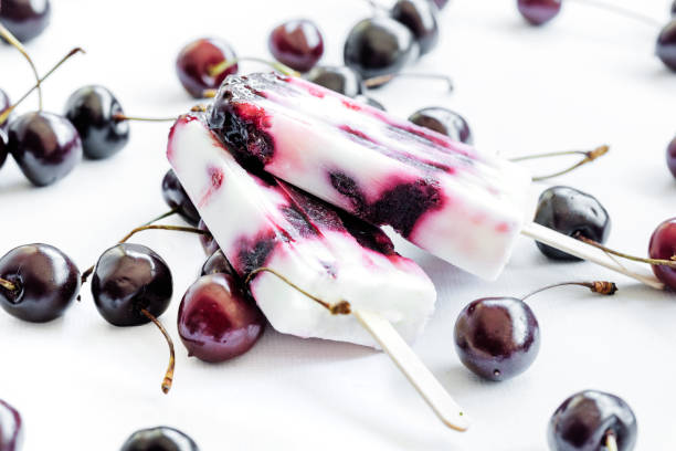 istock Healthy summer dessert. Yogurt and cherries popsicles. 807769996