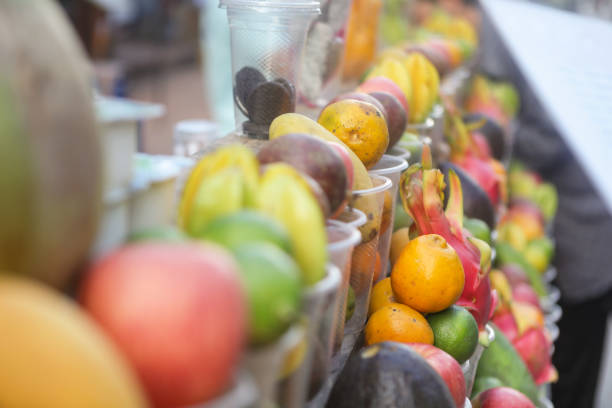 Selection of tropical fruits on market stall