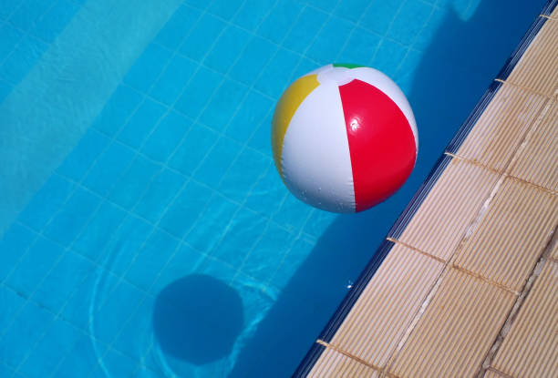 istock Colorful ball floating on a swimming pool 807780686