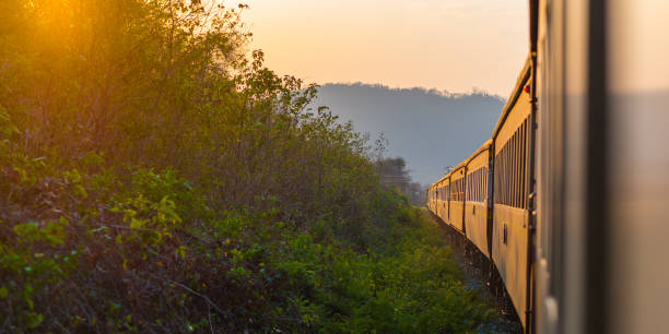 istock Traveling by train to sunset 807807452