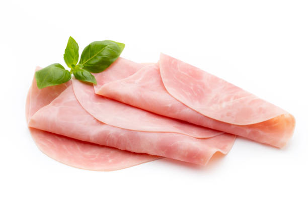 istock Thin slices of ham on white background. 807832424