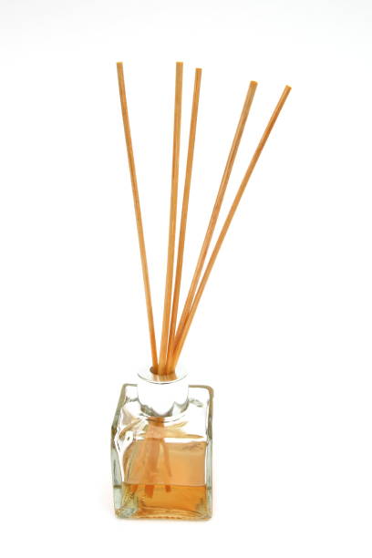 istock Reed diffuser, with reed sticks in a bottle of scented oil, on white background 807847676
