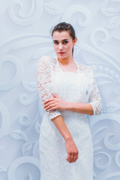istock Breathtaking bride to be in white designer dress 807847936
