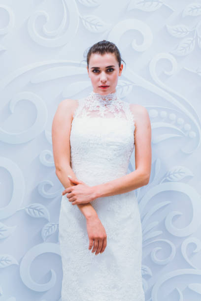 istock Breathtaking bride to be in white designer dress 807851932