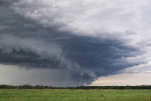 istock Storm cyclone over summer fields, hills and forests 807861904