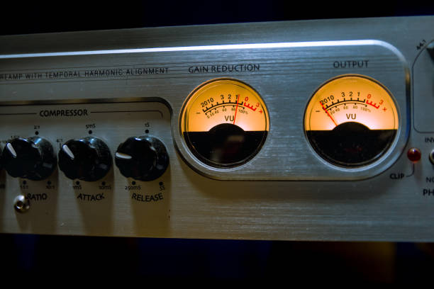 istock Sound mixer equalizer with many buttons and vu meter in recording studio 807864624