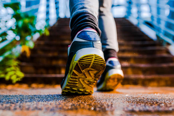 istock Girl running up stairs 807875020