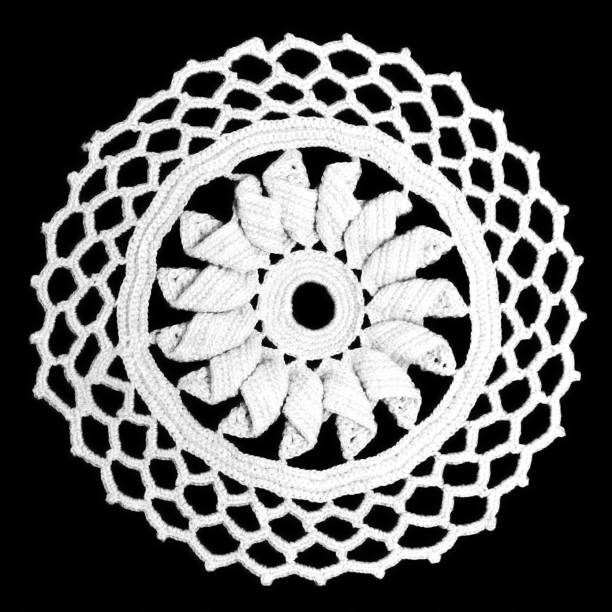 Crochet doily isolated on black background