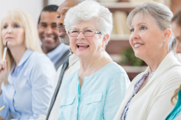 istock Cheerful senior women attend seminar 807900312