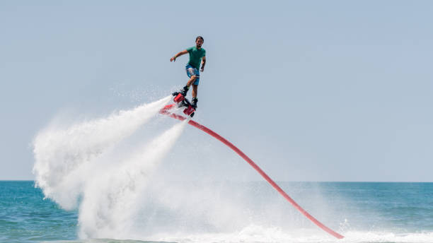Flyboard extreme sport adventure on the Mediterranean sea.