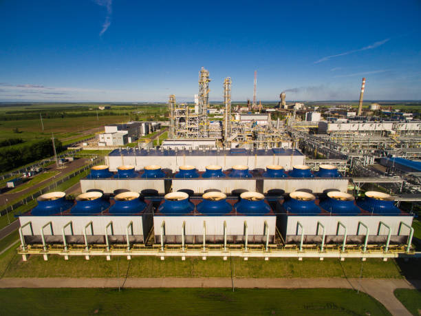 the cooling fans and units for nitric acid production on fertilizer plant. Aerial view Units for nitric acid production on fertilizer plant acid stock pictures, royalty-free photos & images