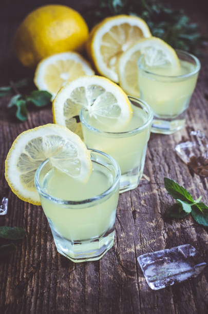 istock Italian traditional liqueur limoncello with lemon 807950988