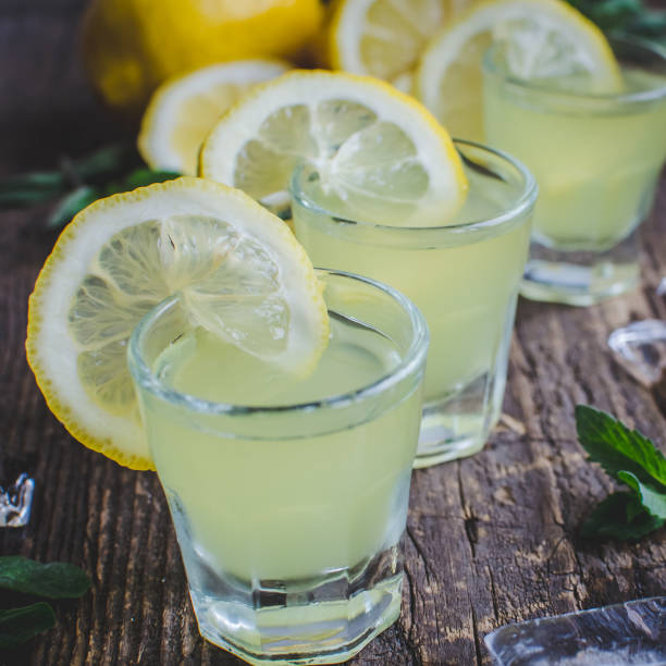 istock Italian traditional liqueur limoncello with lemon 807950990