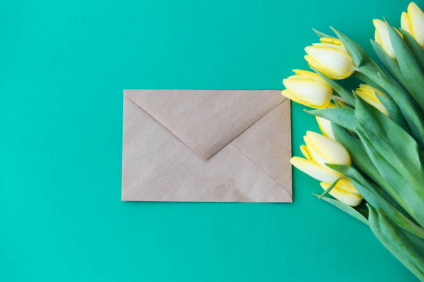 istock Yellow tulips bouquet and envelope 807953538