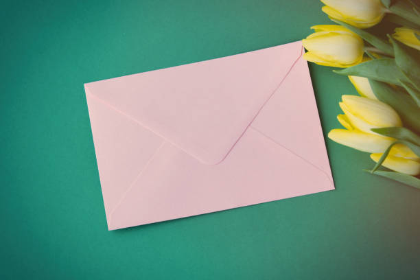 istock Yellow tulips bouquet and envelope 807953558