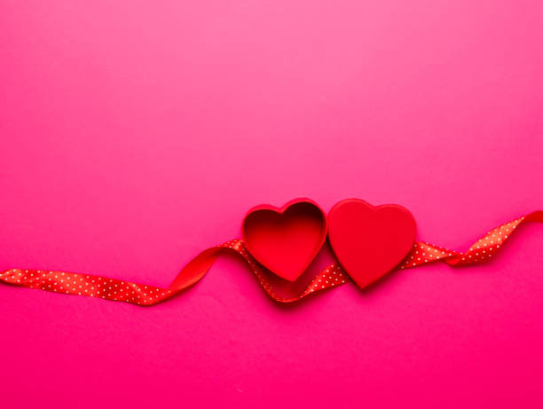 istock Open heart shape red box with ribbon 807954186