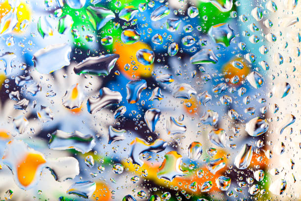 istock Bright blue-yellow abstract background with water drops 807963476