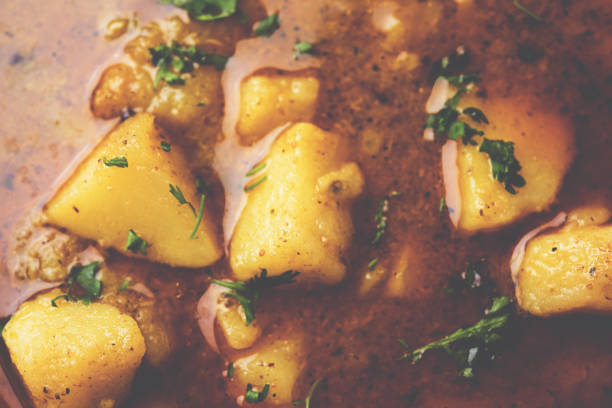 Spicy potato curry, popular indian main course menu, also known as Aloo sabji or sabzi in hindi
