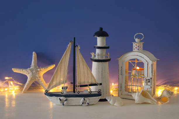 istock Nautical concept with sea life style objects on wooden table. 807983332