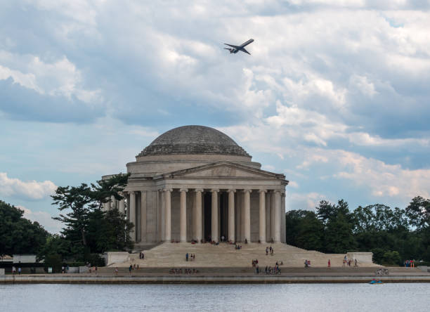 istock Plane over the JEfferson Thomas Memorial in DC 807983686