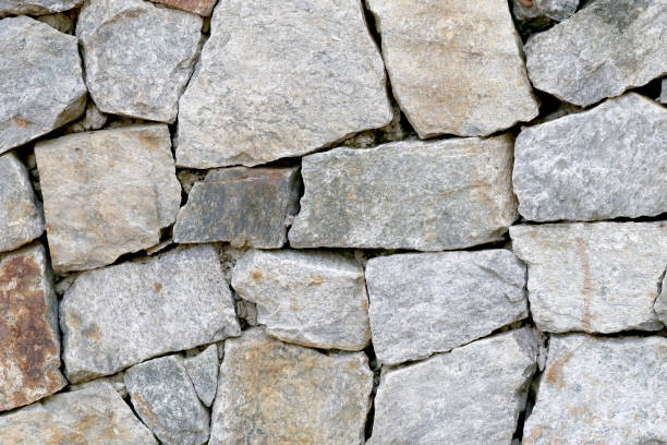 istock Old stone wall Texture in weathered and have natural surfaces for design background. 808010848