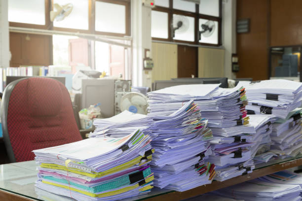 istock Pile of unfinished documents on office desk, Stack of business paper 808019584