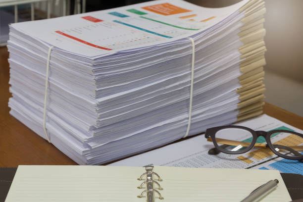 istock Pile of unfinished documents on office desk, Stack of business paper 808019692