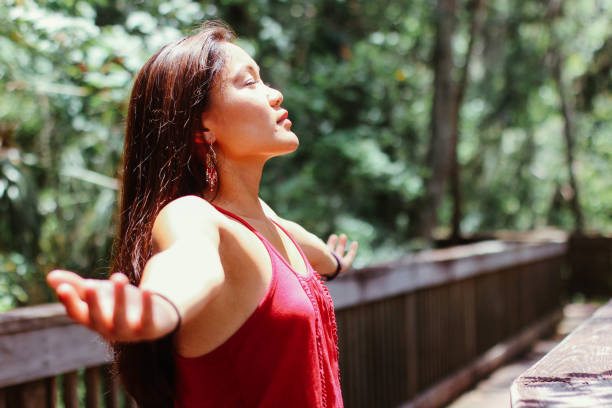 istock Women with arms outstretched 808022656