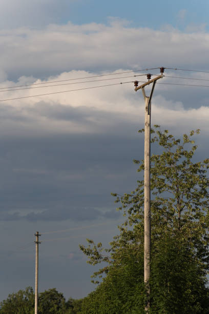 istock powerline on blue sky in south german countryside on a midsummer evening 808047478