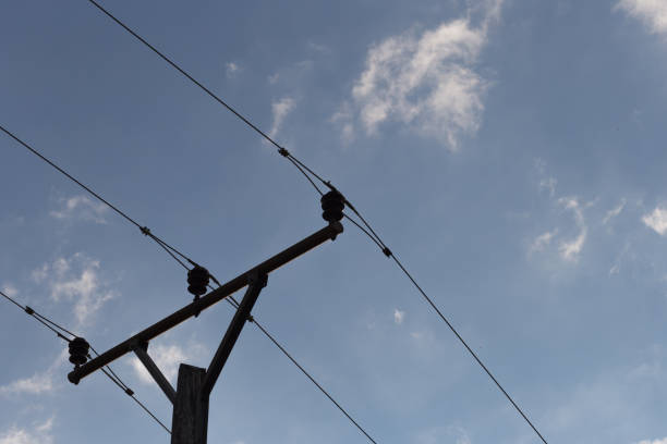 istock powerline on blue sky in south german countryside on a midsummer evening 808049952