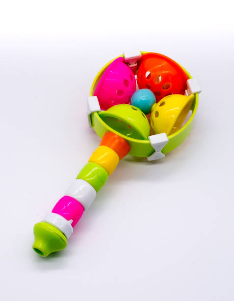 istock Colorful bell baby toy isolated on white 808064328