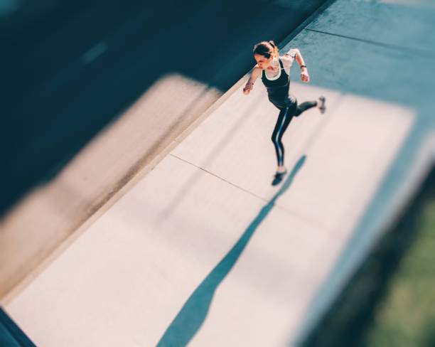 istock Woman jogging in the city 808067600