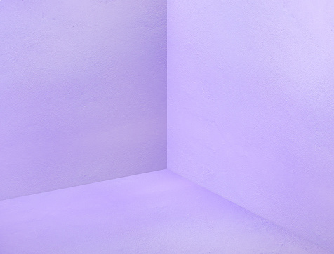 Empty room corner painted in pastel purple color studio room background,Mock up template for display or montage of design or text.