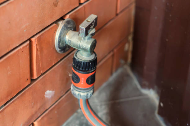 istock Garden tap with hose attached to it 808078496