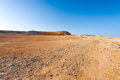 Rocky hills of the Negev Desert in Israel. Wind carved rock formations in the Southern Israel Desert.