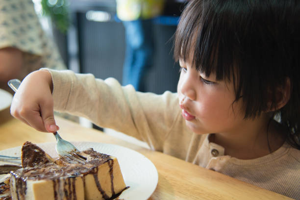 istock Asian boy eating honey toast 808096340