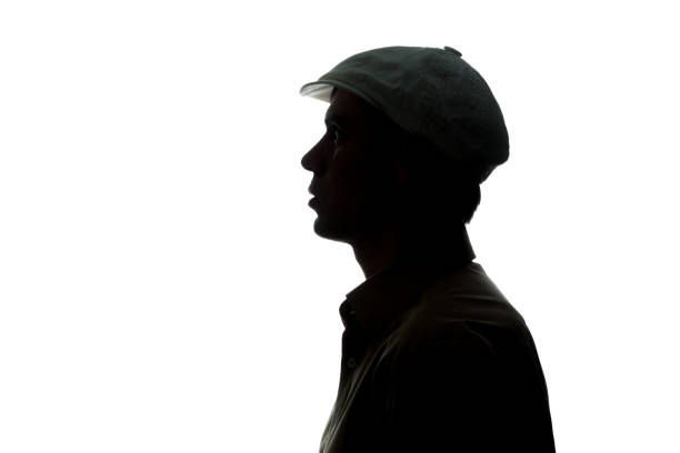 istock Portrait of a young man in cap, side view 808102372
