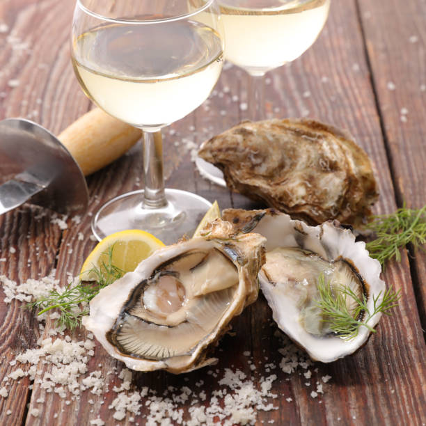 istock oyster and wine glass 808111624