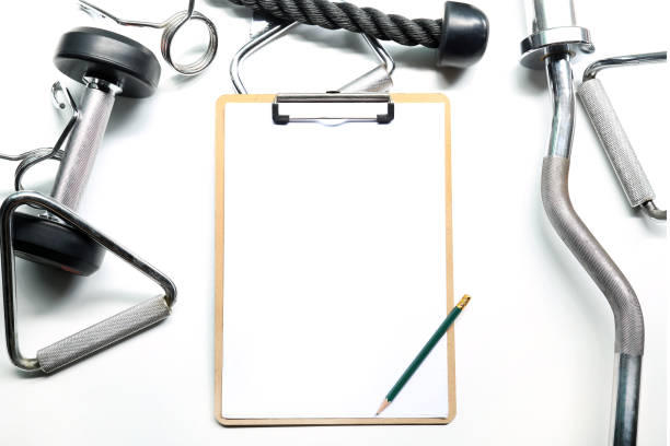 istock Gym equipment background Mockup with clipboard empty blank paper and pencil 808113902